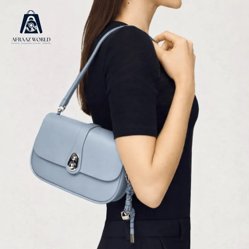 The Lumina Twist-Lock Crossbody Bag