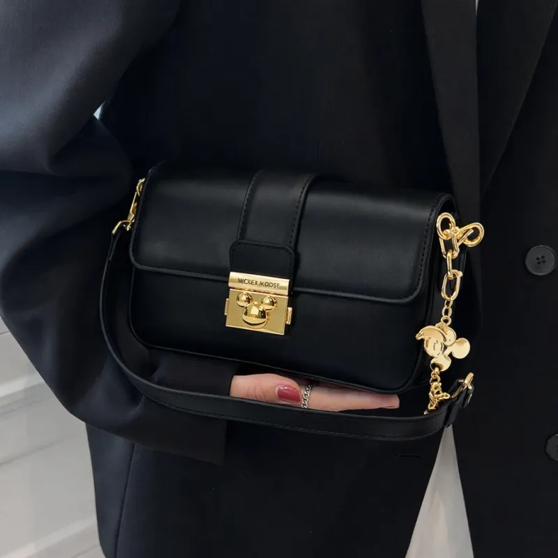 Elegant Black Leather Crossbody Bag with Golden Lock – Afraaz World