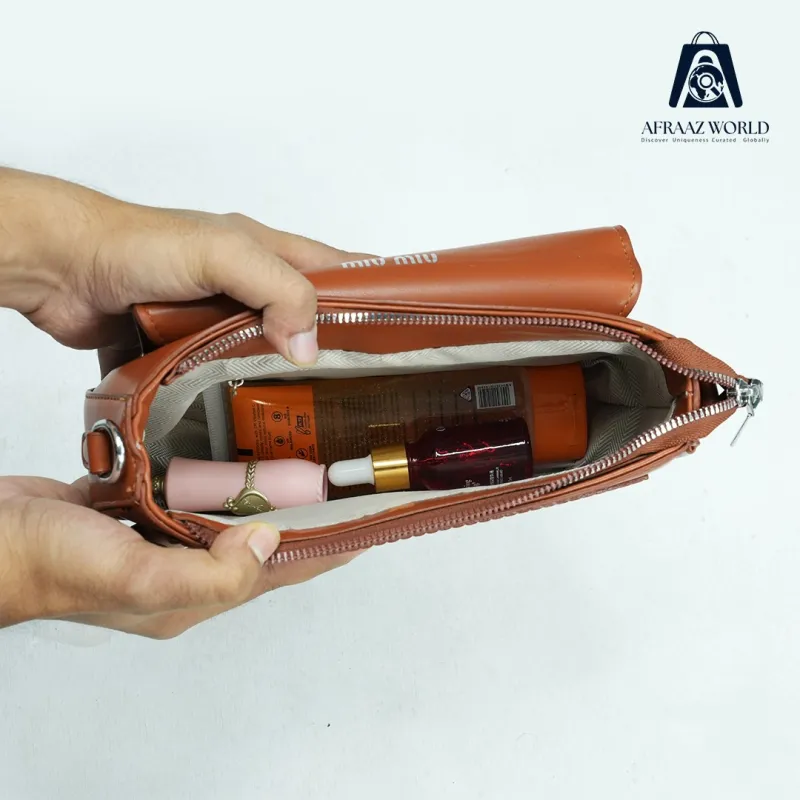 Elegant MIU MIU  Pink Textured Crossbody Bag with Triangle Logo